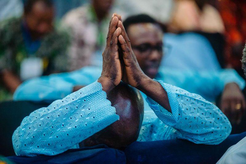 Man praying in devotion
